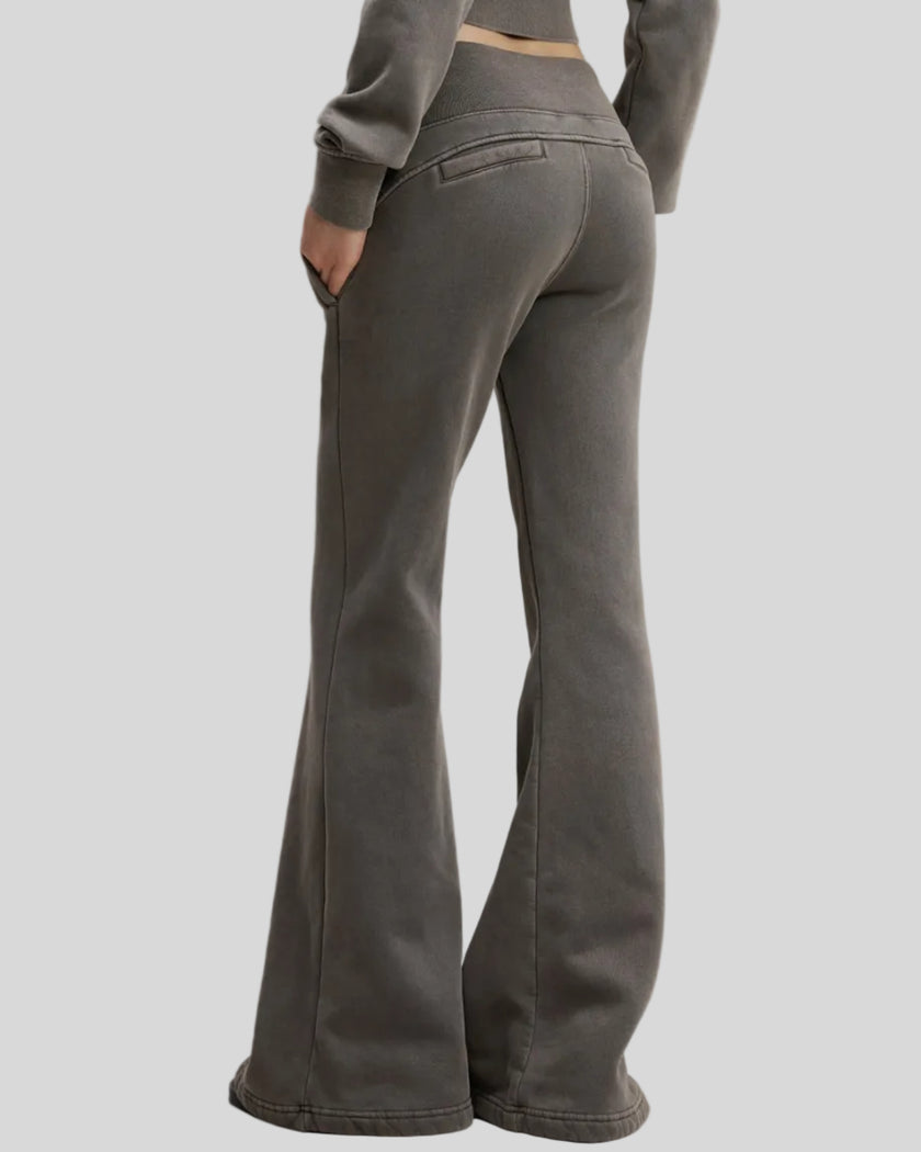 Angled back view of woman wearing Vintage Washed Edition Pants in Dark Gray, showing waistband and leg shape