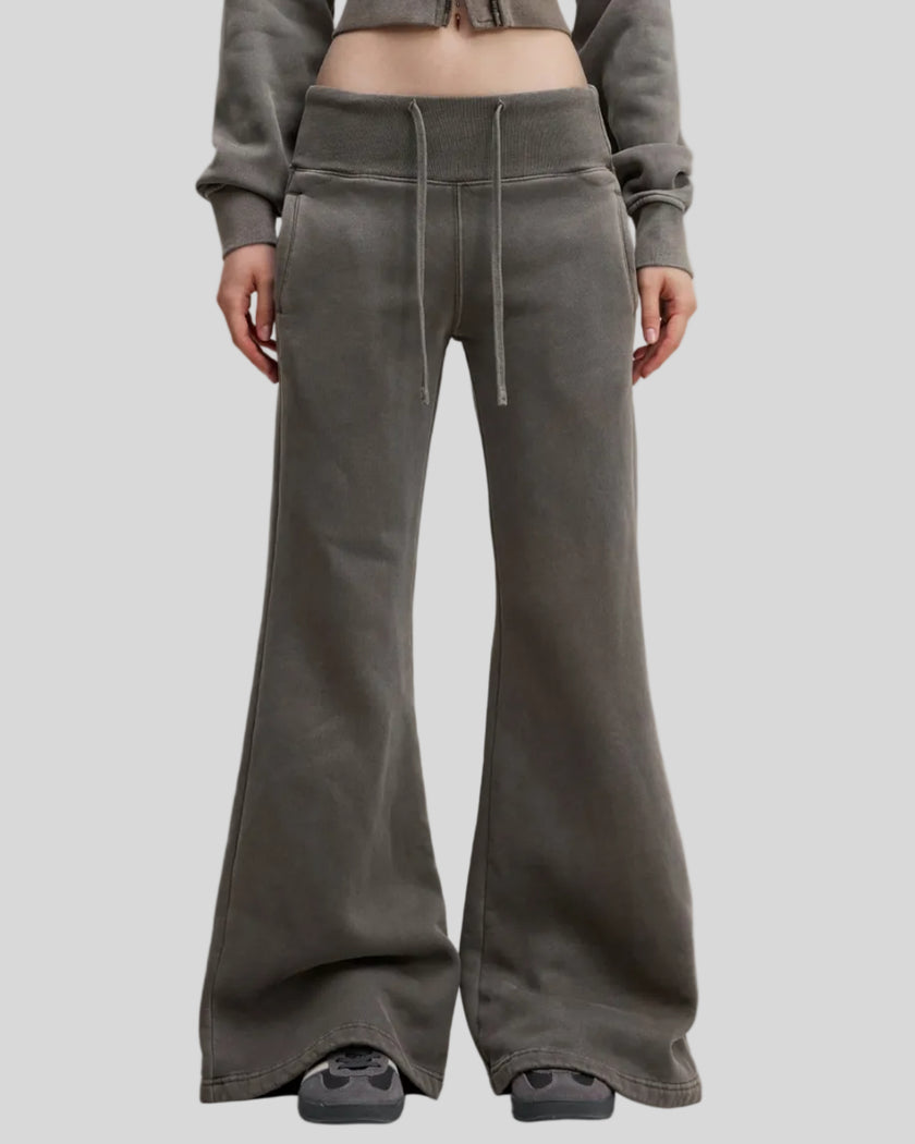 Lower body front view of woman wearing Vintage Washed Edition Pants in Dark Gray, showing flared leg silhouette