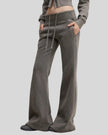 Lower body side view of woman wearing Vintage Washed Edition Pants in Dark Gray