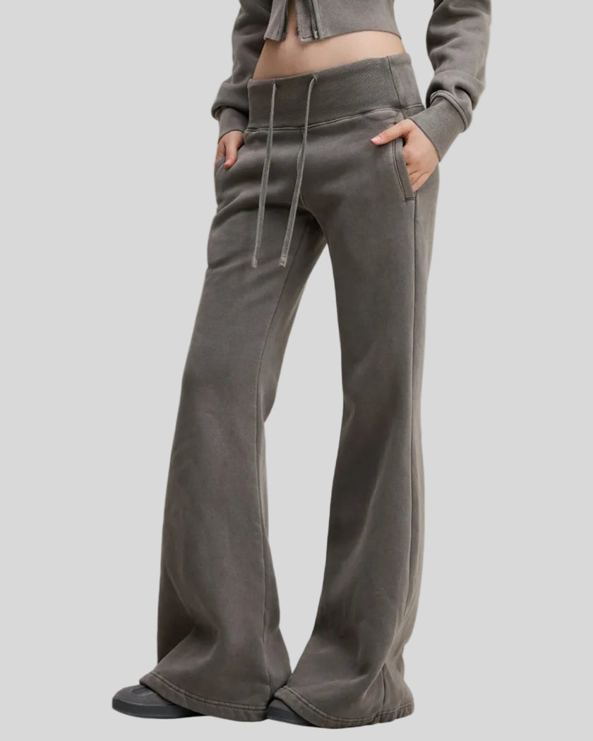 Lower body side view of woman wearing Vintage Washed Edition Pants in Dark Gray
