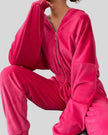 Hot pink zip lounge set shown from front angle