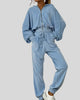 Light blue zip-up lounge set worn full body front view
