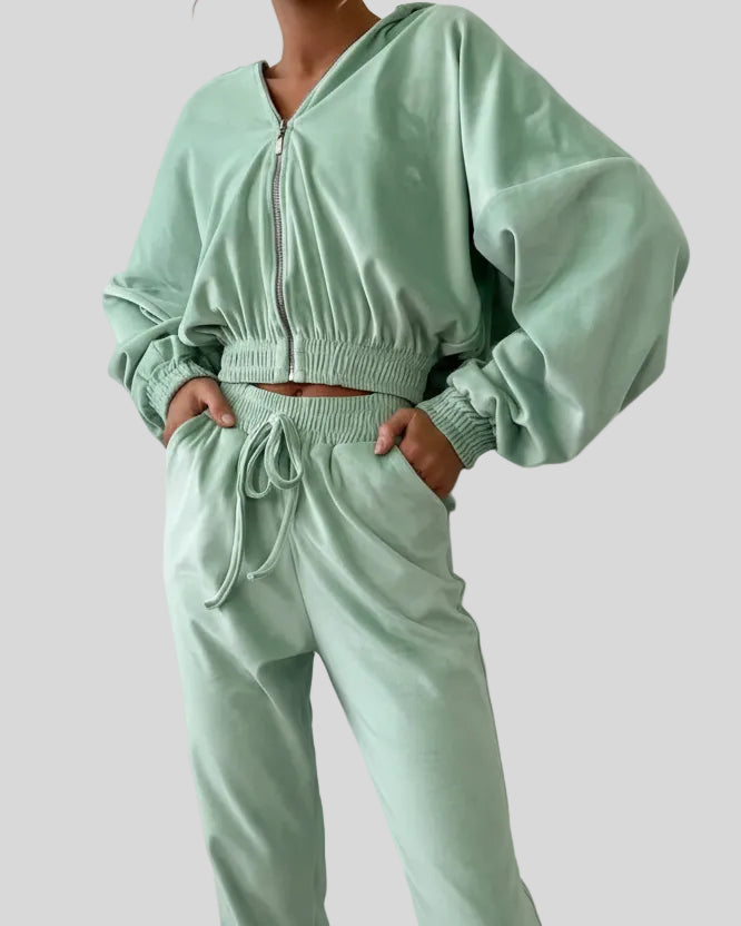Front closeup of light green zip lounge top and pants