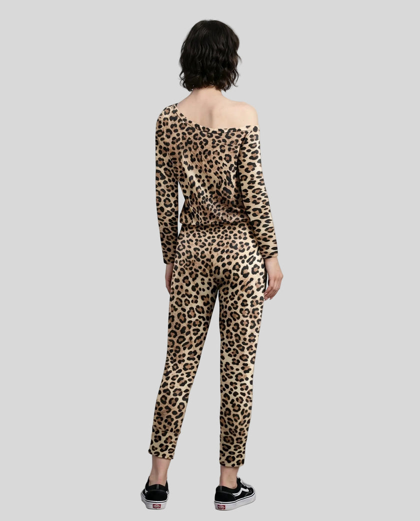Model wearing Athlesi leopard top and pant set full body back view