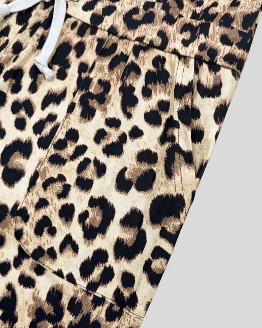 Waistline and pocket detail on Athlesi leopard pant set