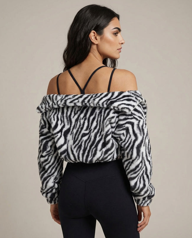 WildForm Plush Zip Jacket in black worn by model back view highlighting full pattern and silhouette