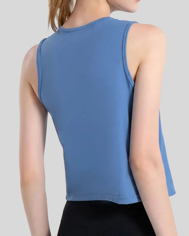 Back view of CoreLine Active Tank in dusty blue with clean, minimal finish