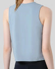 Close-up back detail of CoreLine Active Tank in light blue, smooth and opaque fabric