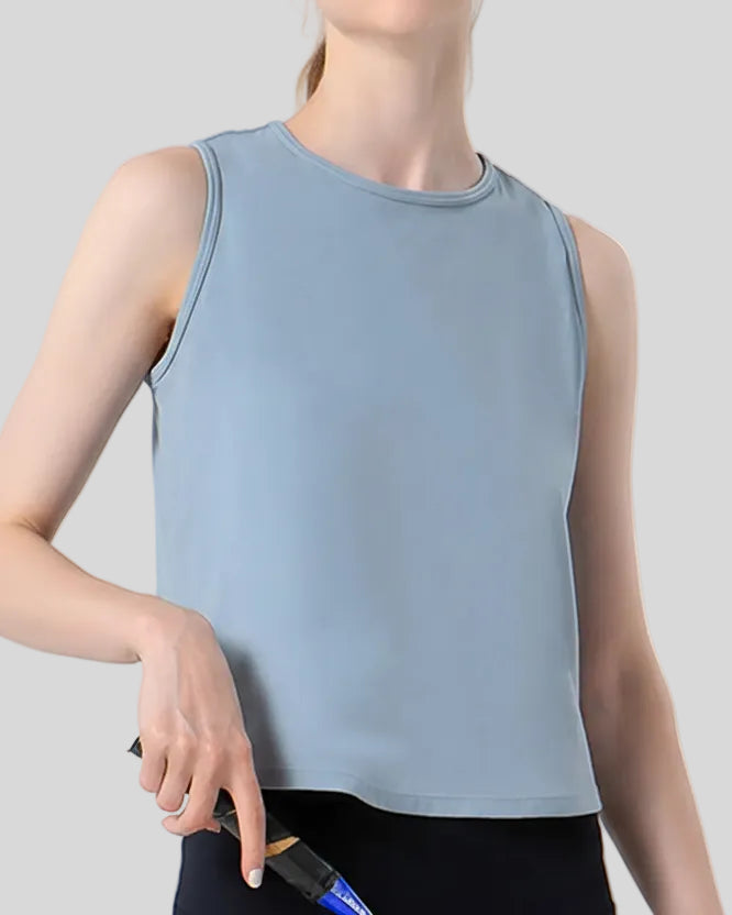 CoreLine Active Tank in light blue, front view with round neckline and clean silhouette
