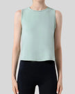 CoreLine Active Tank in light green, front view with round neckline and clean silhouette