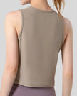 Close-up back detail of CoreLine Active Tank in tan, smooth and opaque fabric