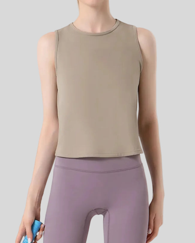 CoreLine Active Tank in tan, front view with round neckline and clean silhouette