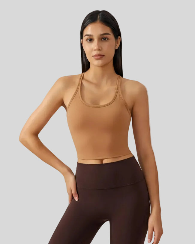 Ease Sculpt Scoop Neck Tank in caramel worn by model, featuring cropped length