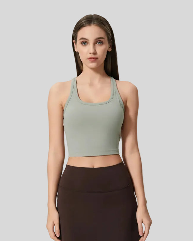 Ease Sculpt Scoop Neck Tank in sage worn by model, featuring cropped length