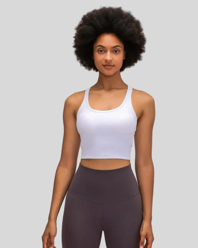 Ease Sculpt Scoop Neck Tank in white worn by model, featuring cropped length