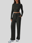 Side view of EaseLounge long-sleeve lounge set in Black showing fluid drape and relaxed silhouette