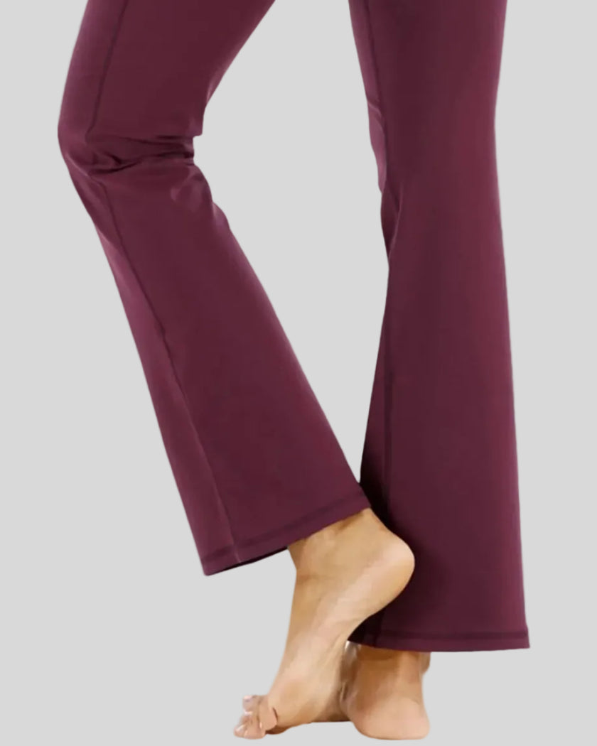 Close-up of leg fit and drape on Athlesi FlexEase Pocket Active Pant in burgundy