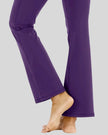 Close-up of leg fit and drape on Athlesi FlexEase Pocket Active Pant in violet