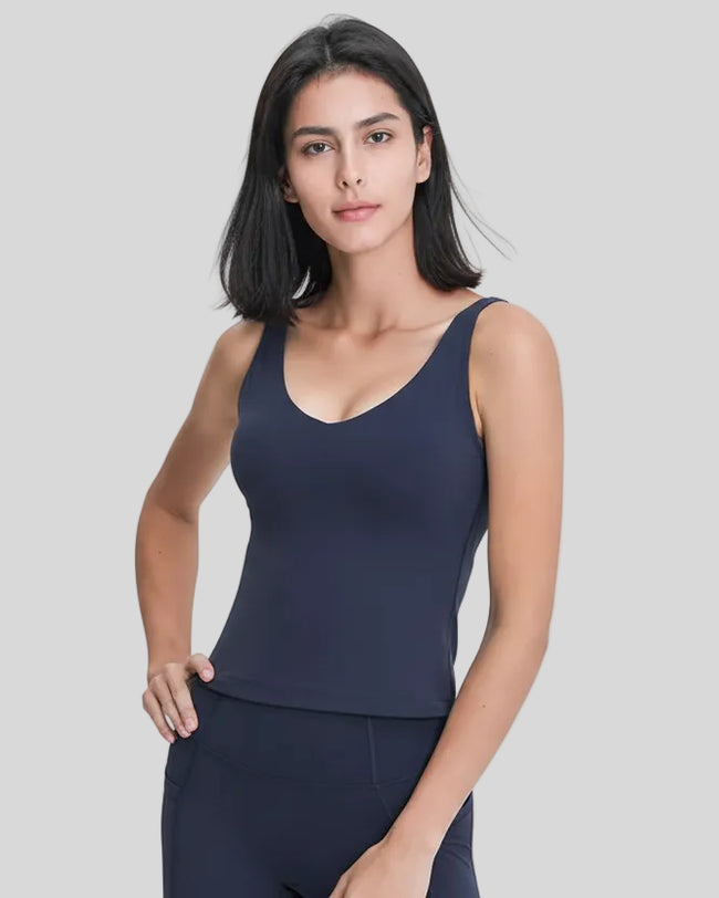 Navy V-neck active tank with soft fabric and clean front silhouette