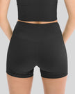 Close-up of ribbed fabric and waistband on black active short