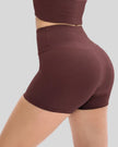 Side view of ribbed legging-style active short in burgundy