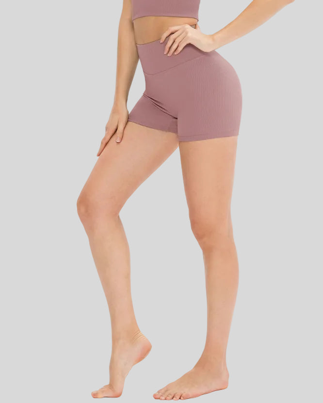 Side view of ribbed legging-style active short in dusty pink