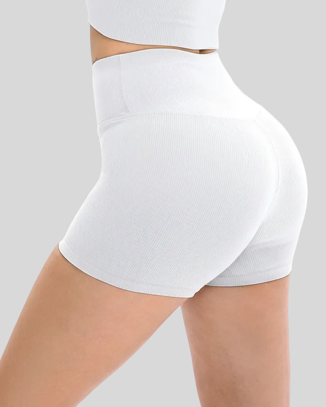 Close-up of ribbed fabric and waistband on white active short