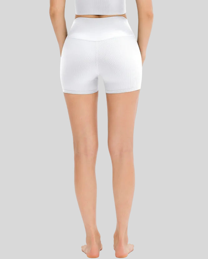 Back view of white ribbed high-waist active short with smooth legging fit