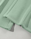 Close-up of pant hem detail on UrbanFlow drawstring pants in sage