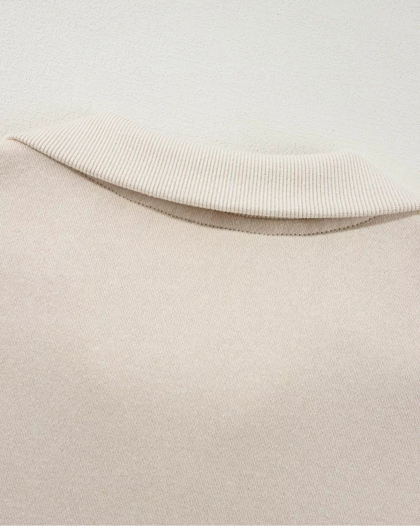 Close-up of back collar detail on UrbanFlow zip jacket in beige
