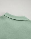 Close-up of back collar detail on UrbanFlow zip jacket in sage