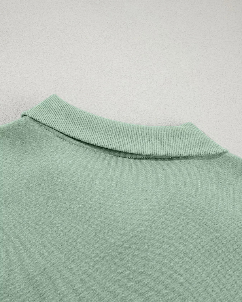 Close-up of back collar detail on UrbanFlow zip jacket in sage