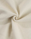 Detailed fabric texture close-up showing soft cotton-blend finish in beige