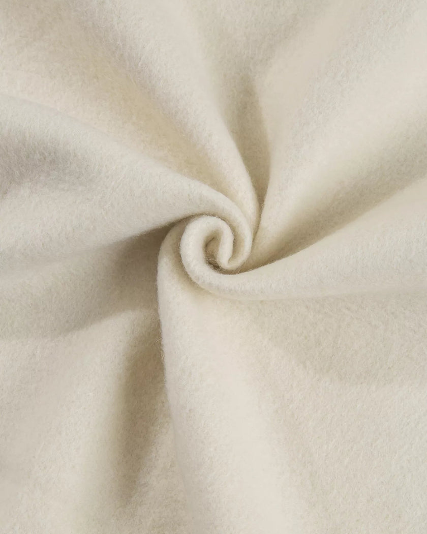 Detailed fabric texture close-up showing soft cotton-blend finish in beige