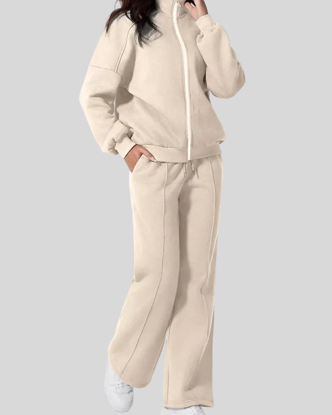 Side angle view of UrbanFlow two-piece jacket and pant set in beige