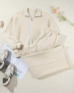 Front flat lay of UrbanFlow zip jacket and pant set in beige