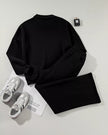 Back flat lay of UrbanFlow zip jacket and pant set in black