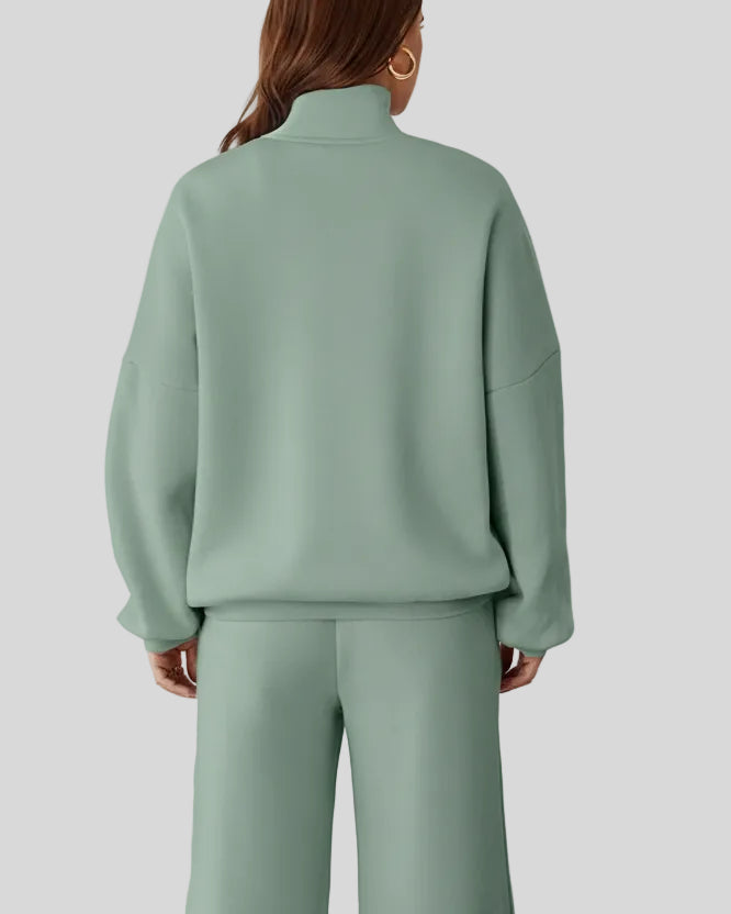 Back view of UrbanFlow zip jacket and drawstring pants set in sage