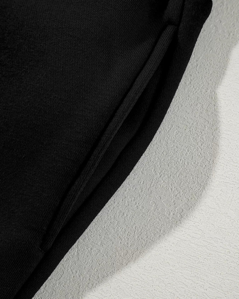 Close-up of functional pocket detail on UrbanFlow jacket in black