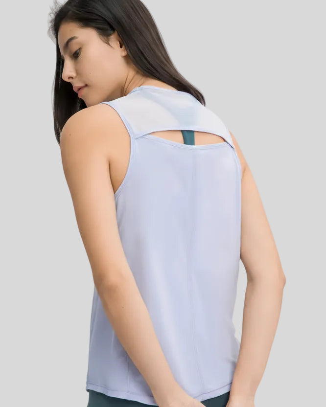 Close-up of VeilBack Active Tank cutout back and semi-sheer fabric texture in baby blue