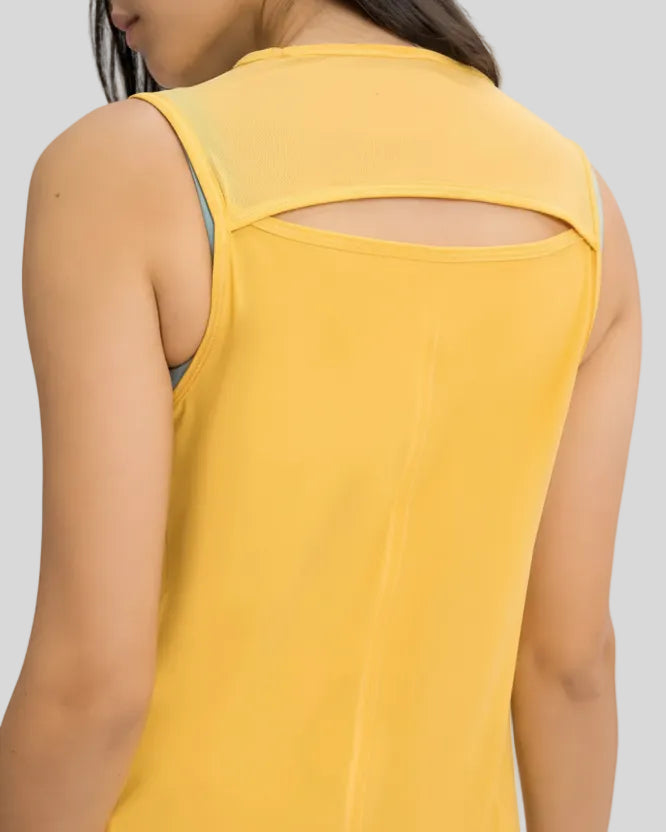 Close-up of VeilBack Active Tank cutout back and semi-sheer fabric texture in yellow