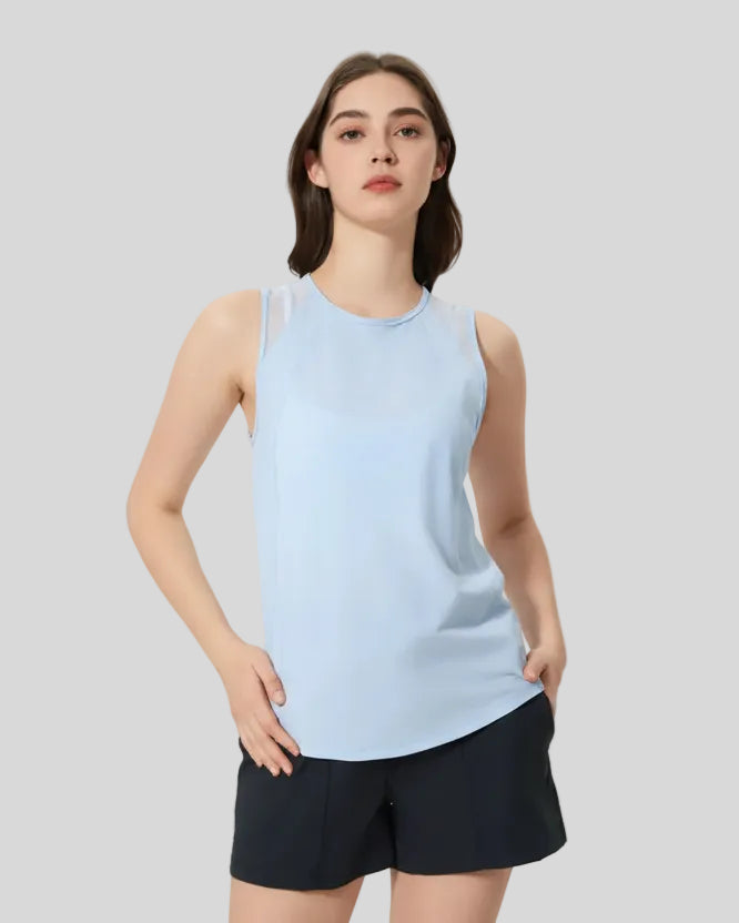 VeilBack Active Tank front angle showing lightweight drape and sleeveless cut in baby blue