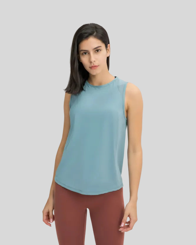 VeilBack Active Tank front angle showing lightweight drape and sleeveless cut in teal
