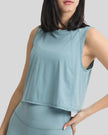 Close-up of front fabric and neckline on air force blue VeilBack Cropped Active Tank