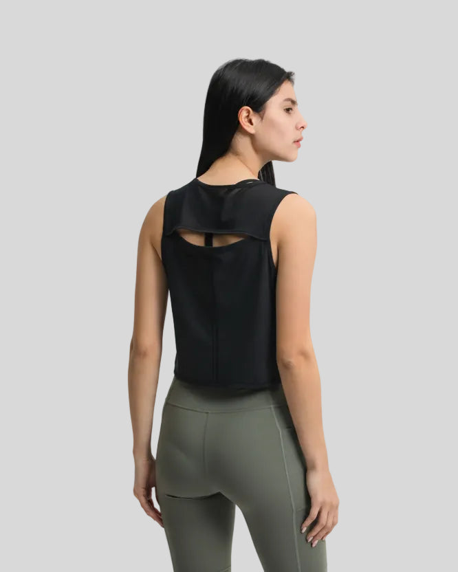 Back view of black VeilBack Cropped Active Tank with sheer cutout detail
