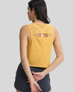 Back view of gold VeilBack Cropped Active Tank with sheer cutout detail